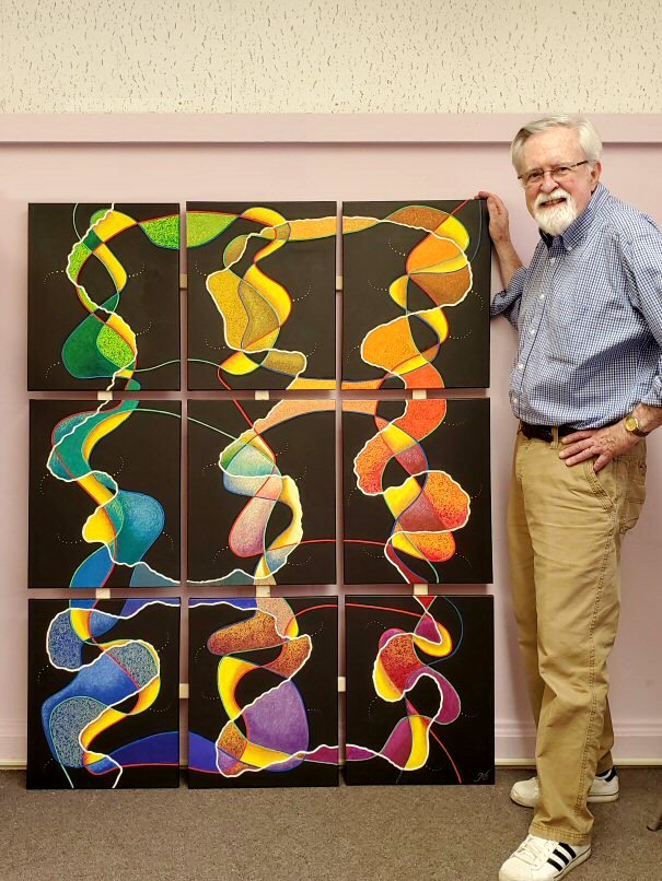 Bennett with a multi-panel
                                    painting